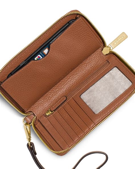 cell phone wallet michael kors|Michael Kors multifunction wallet.